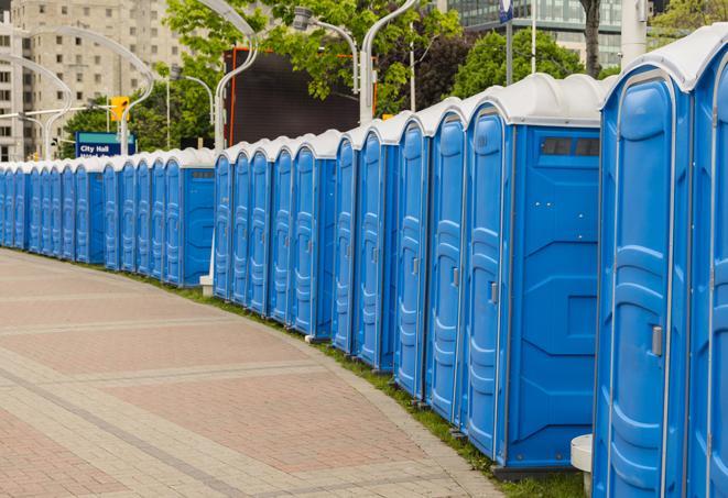 a row of portable restrooms at a fairground, offering visitors a clean and hassle-free experience in Guthrie